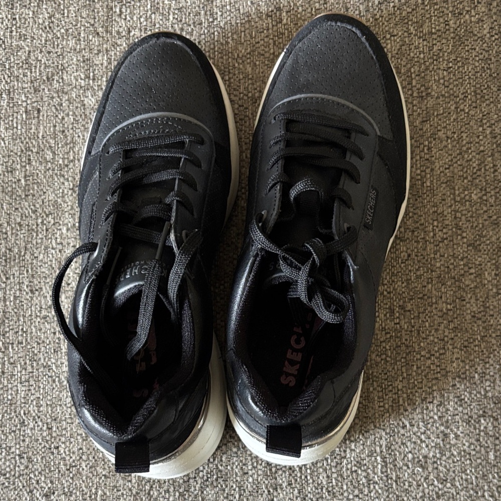 Black Skechers woman’s tennis shoe - never worn - size 7.5